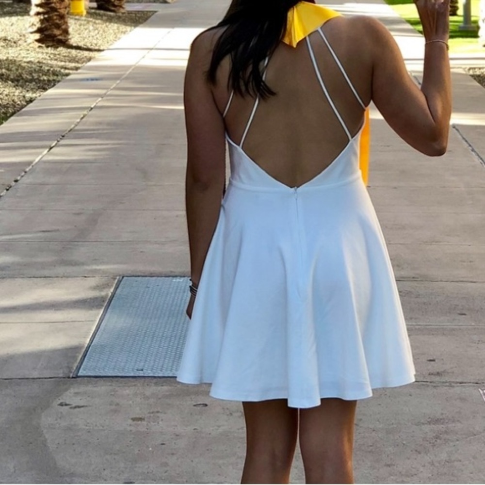 White Halter-Style Open-Back Dress with Yellow Accent